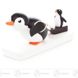 Dregeno Erzgebirge Sammelfigur Miniatur Pinguin Ausreißer Breite x Höhe x Tiefe 6,5 cmx3,5 cmx2 cm, Miniaturfigur Pinguin mit Schlitten und Baby