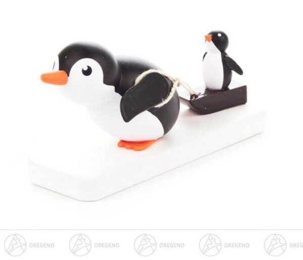 Dregeno Erzgebirge Sammelfigur Miniatur Pinguin Ausreißer Breite x Höhe x Tiefe 6,5 cmx3,5 cmx2 cm, Miniaturfigur Pinguin mit Schlitten und Baby