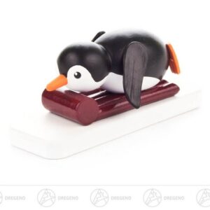 Dregeno Erzgebirge Sammelfigur Miniatur Pinguin Nichtschwimmer Breite x Höhe x Tiefe 6 cmx2,5 cmx2, Miniaturfigur Pinguin auf Schlitten