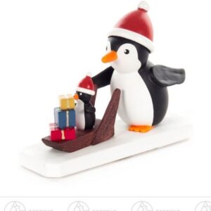 Dregeno Erzgebirge Sammelfigur Miniatur Pinguin Weihnachtsexpress Breite x Höhe x Tiefe 6,4 cmx5 cm, Miniaturfigur Pinguin mit Schlitten Geschenke und Baby